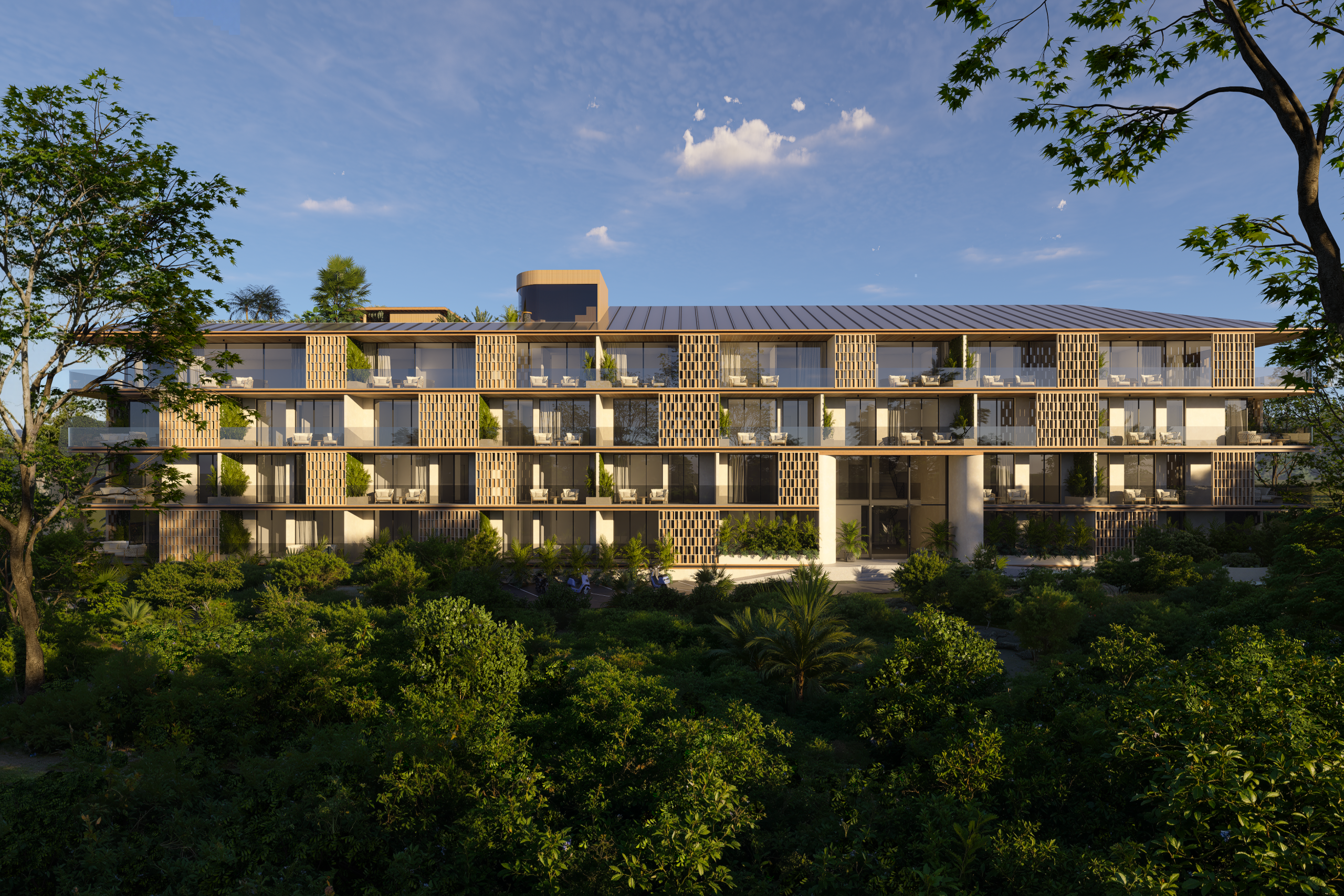 Exterior facade of a beachside apartment development in Canggu, Bali with ocean-facing balconies